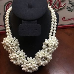 Feature a five A Grade freshwater pearl clusters and crystalize rhinestone balls